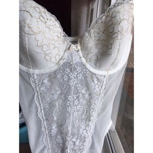 Victoria’s Secret lacy corset with gold trimmings